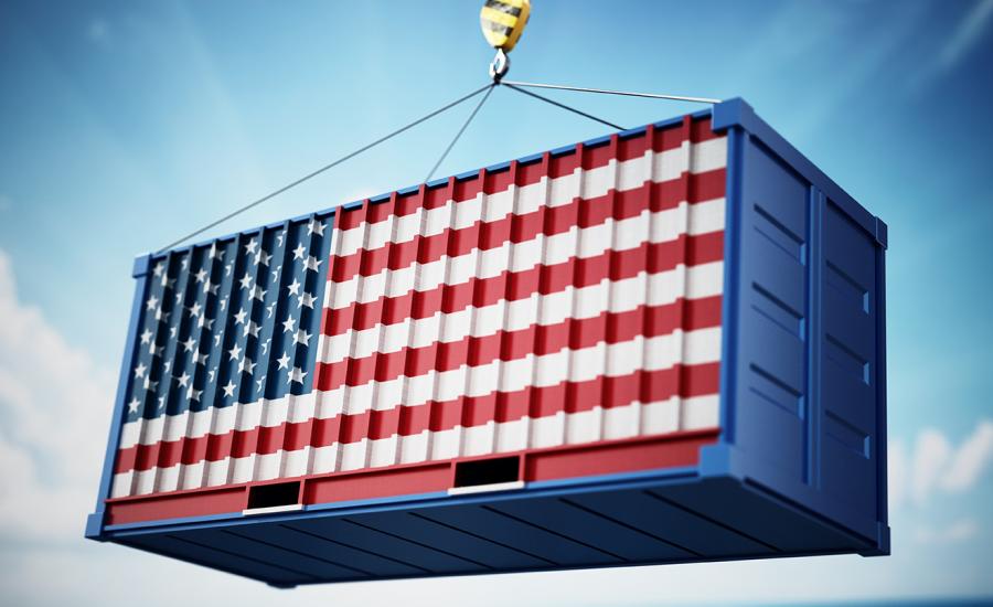 Shipping container with U.s. flag on side of it. 