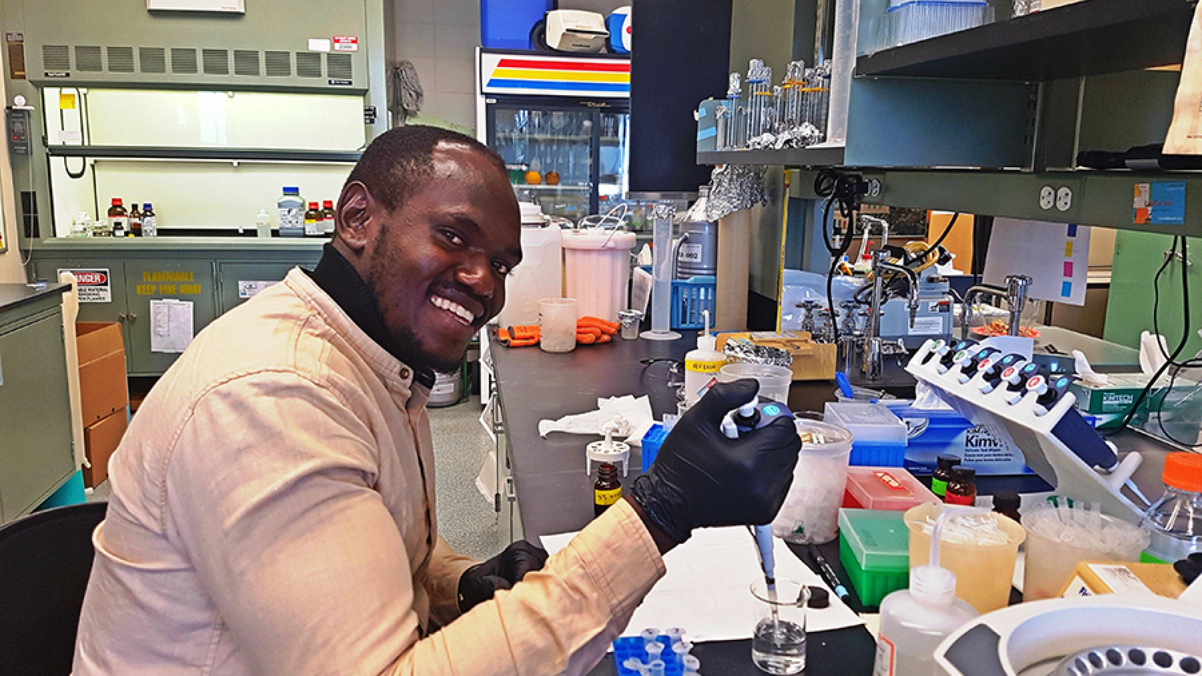 USDA Borlaug Fellow Kwame Ogero from the International Potato Center in Tanzania conducts research on virus prevention in sweet potatoes with his Louisiana State University mentors Christopher Clark
