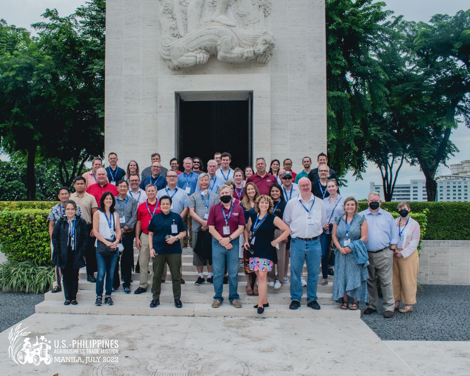 The USDA trade delegation included representatives from 10 state departments of agriculture and 29 businesses and agricultural organizations. Here they are at the Manila American Cemetery.